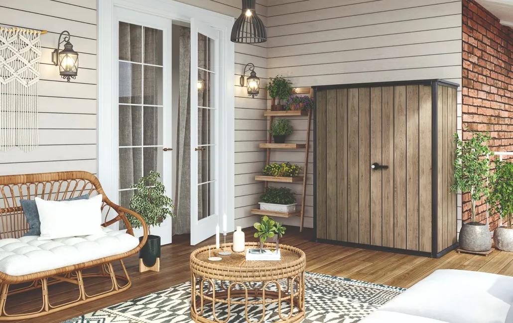 Outdoor storage cabinet beside a house